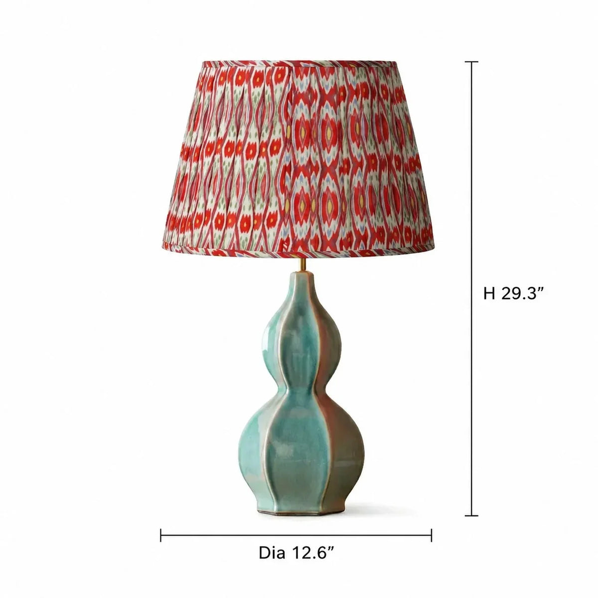 Decorative lamp with a patterned shade and measurements on a white background