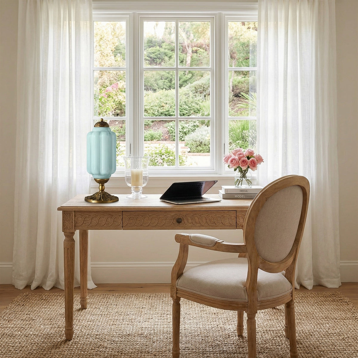 Wooden desk with chair in a room with large windows and garden view