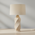 Declan twisted ceramic table lamp shown from the front on white